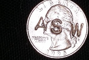 Quarter-With-Asw-Stamped-Across-Entire-Quarter