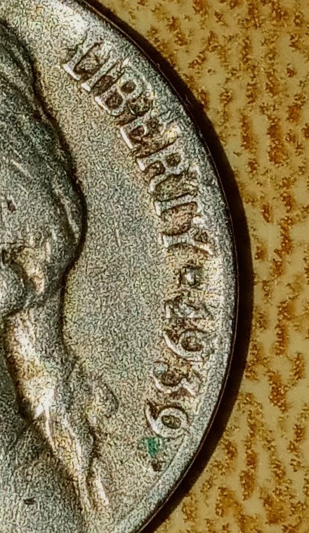 1939-Nickel-With-What-Seems-Like-The-Number-2-In-The-Date