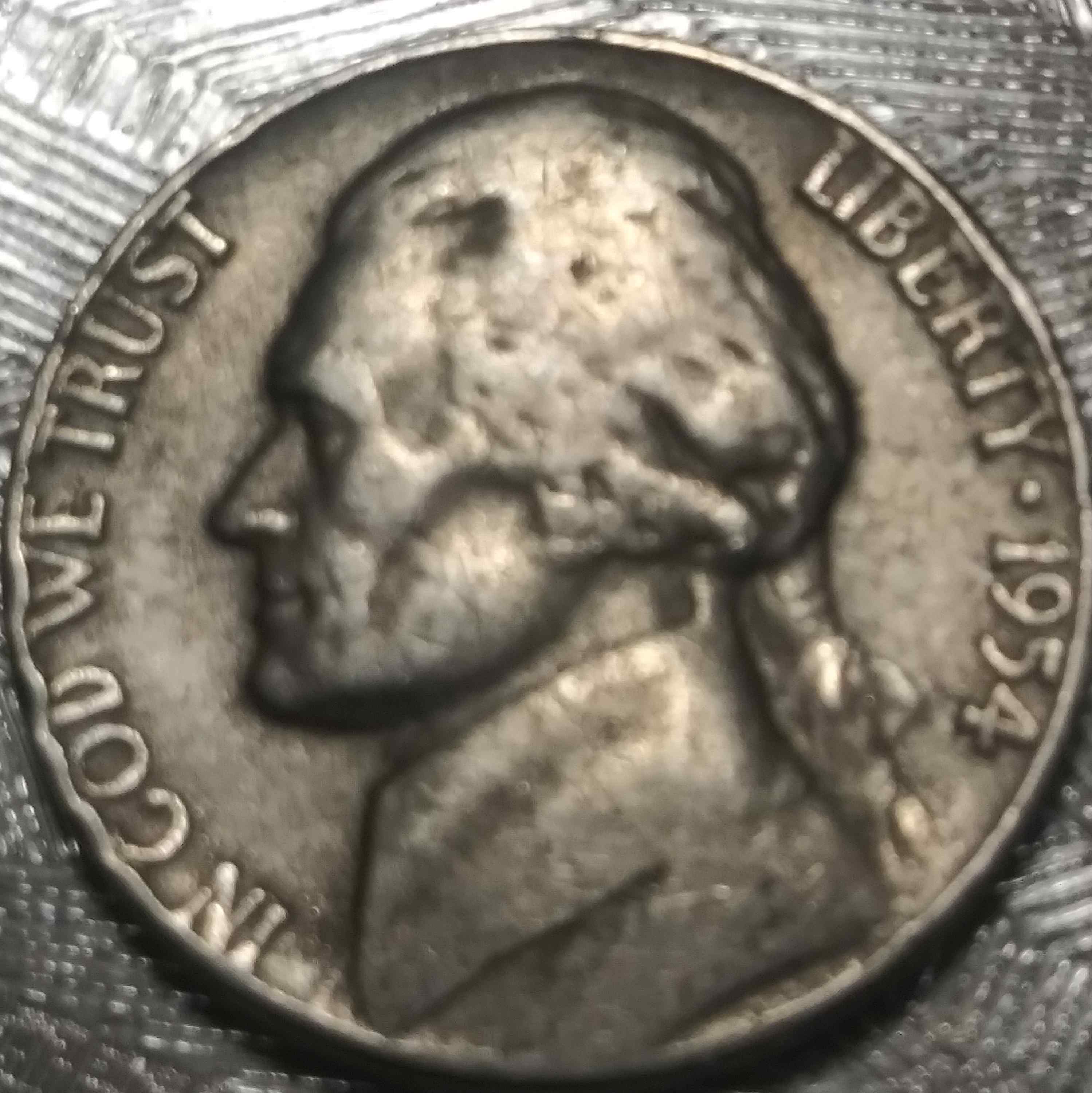 1954-Jefferson-Nickel-With-An-Extra-Letter?--Above-The-P-On-Reverse