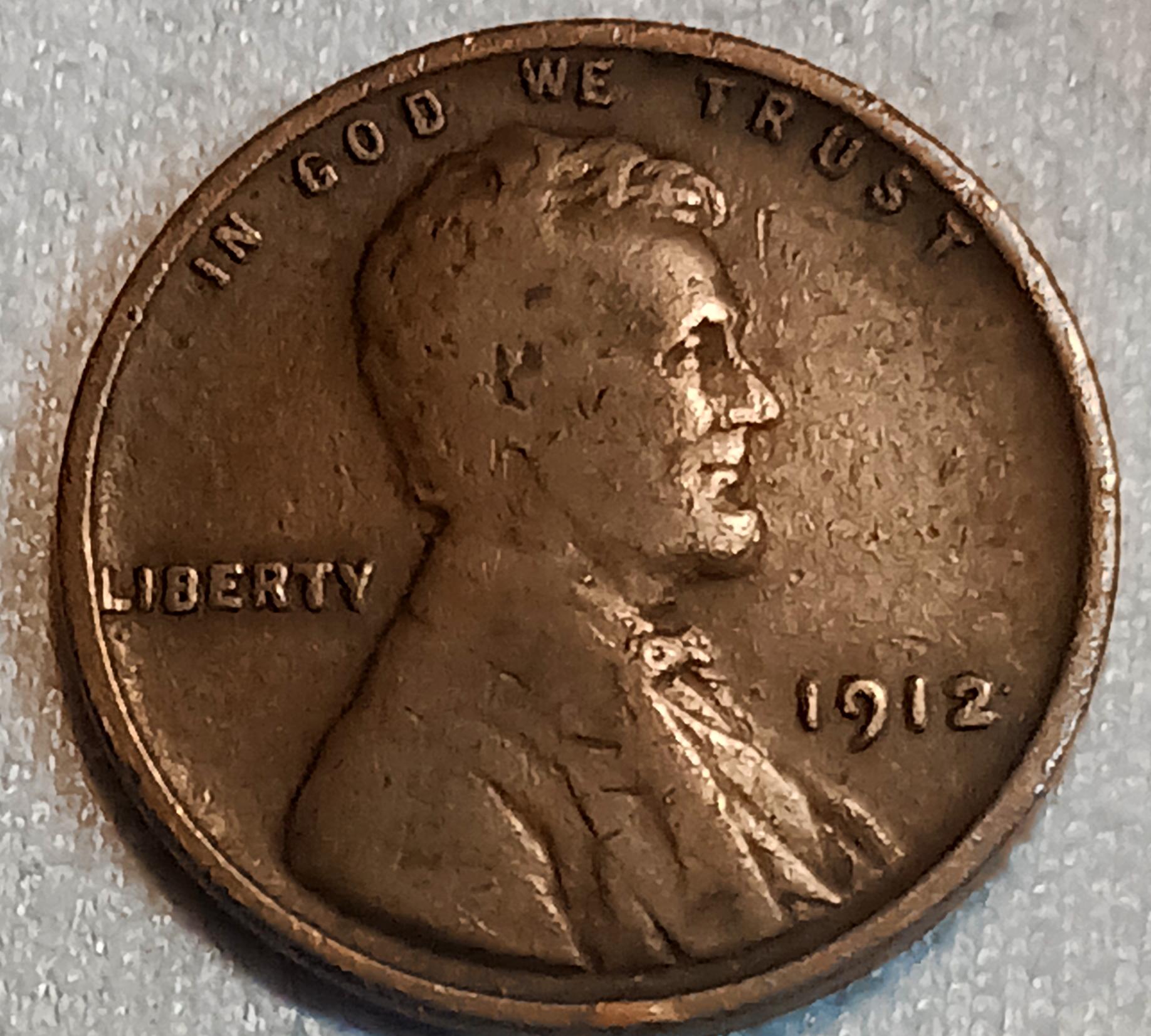 1912-Lincoln-Wheat-Cent.-What-Is-That-Next-To-The-Date