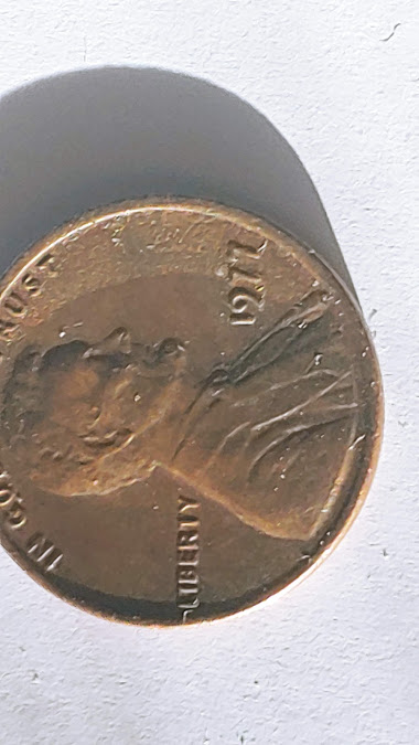 1977-Penny-Looks-Double-Stamped