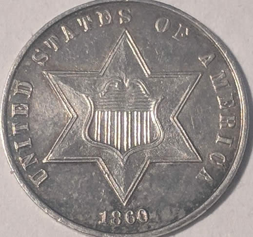 Help!-Very-Nice-Silver-Trime-With-What-Looks-Like-A-Strike-Through.