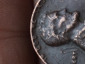 Can-Anyone-Explain-What's-Happened-To-The-Y-On-This-1968-Penny!?