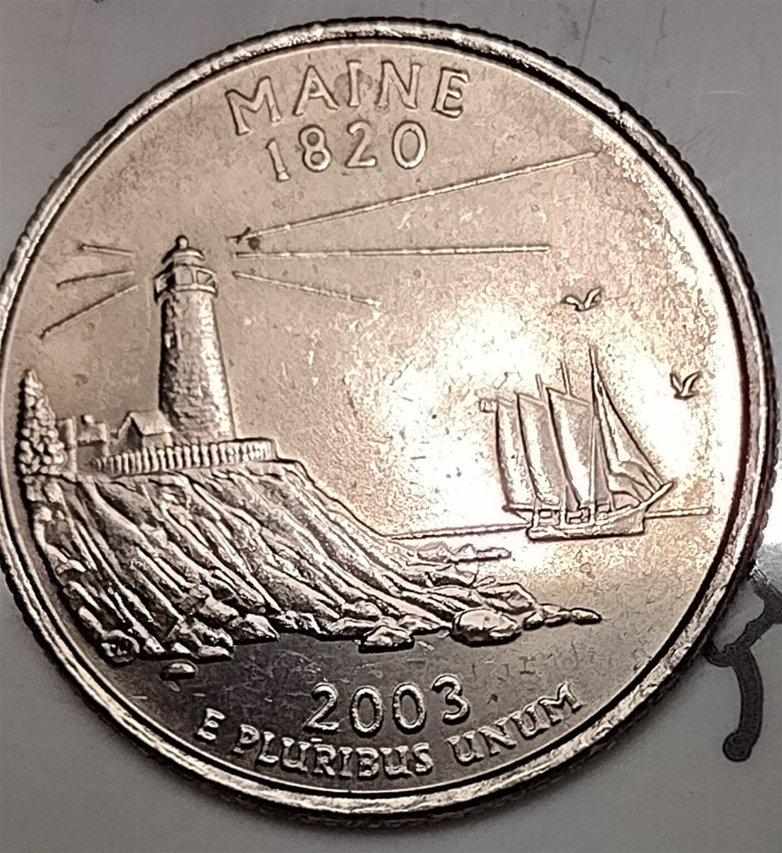 2003-P-Maine-State-Quarter.-The-B-In-Liberty-Is-Filled-In-Also-The-W-On-In-God-We-Trust-DDO&ddr?