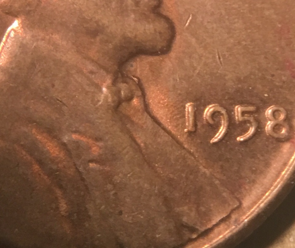 1958-Penny-With-Strange-Marks-On-Bowtie