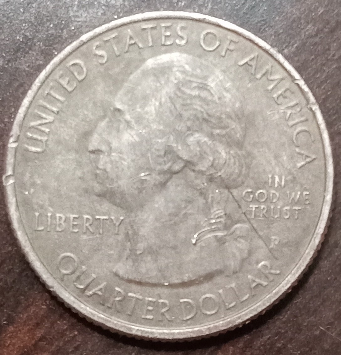 2016-Harpers-Ferry-Quarter-Appears-To-Be-Error-In-Cladding-Its-Color-Is-Very-Different