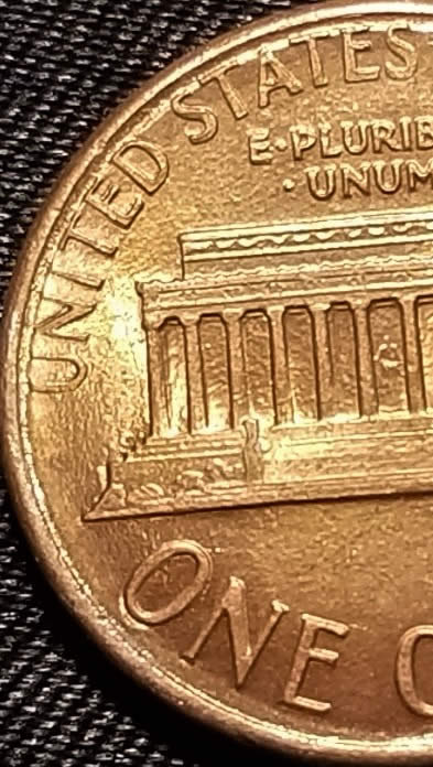 Strange--Fg-Stamp-Looks-Slanted-1987-D-Lincoln-Cent