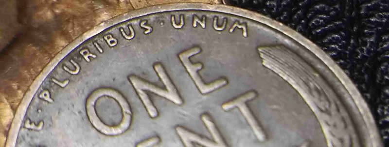 1934-D-Wheat-Penny,-Odd-Bowtie,-Missing-Area-In-Armpit,-And-T-In-Cent-Shado