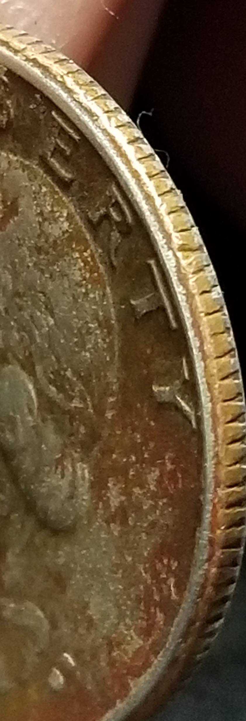 1977-Quarter-With-A-Edge-On-Rim