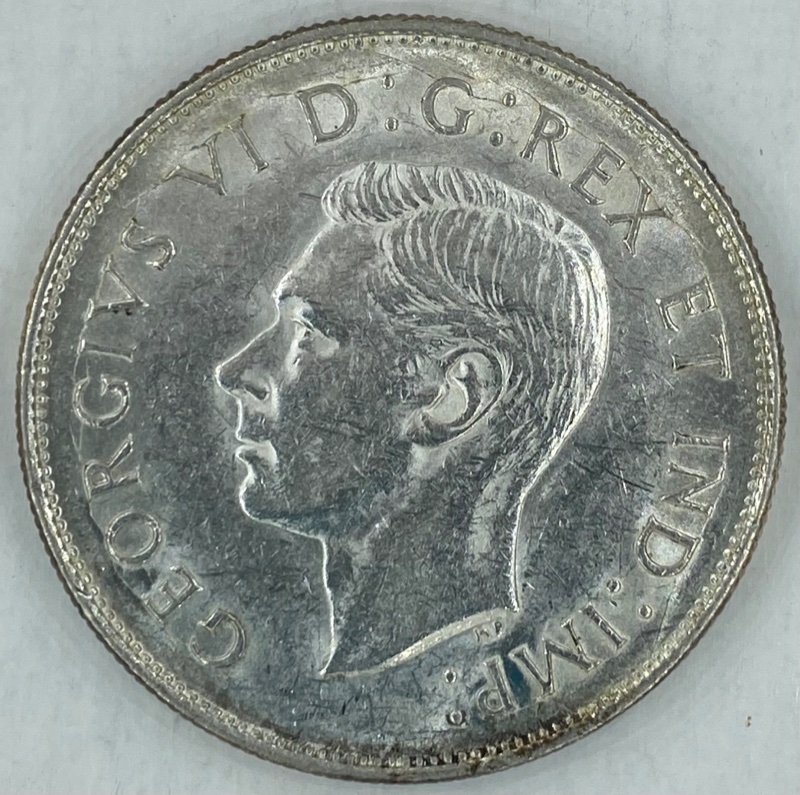 Die-Cracks-On-A-1942-50-Cent-Piece