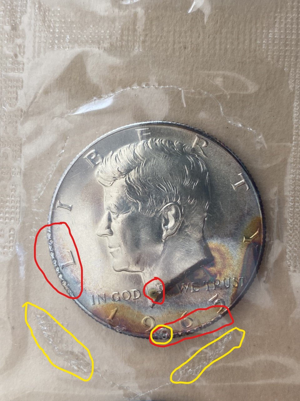 1965-SMS-Kennedy-Half-Damaged-By-Packaging-Process.-Error?