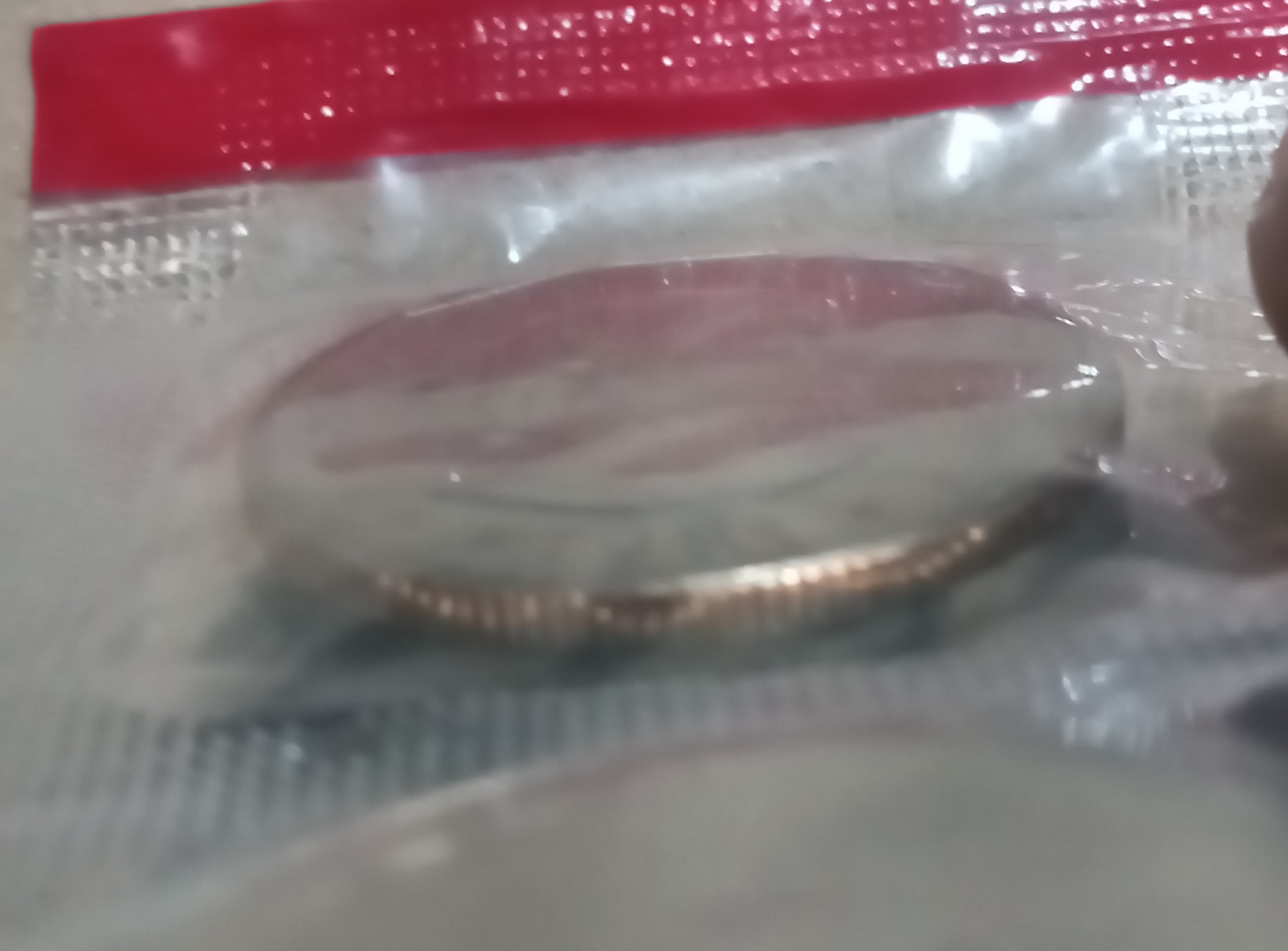 Uncirculated-SBA-Dollar-In-Intact-Mint-Cellophane-With-Mystery-Scratch