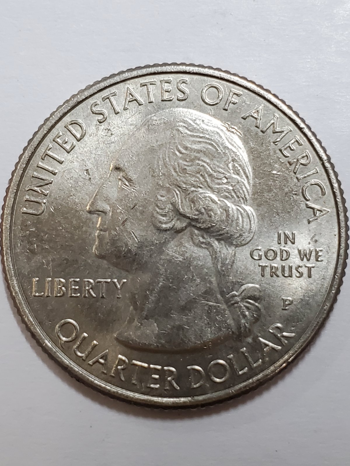 2020-P-Salt-River-Bay-Quarter,-Mark-On-Top-Of-Head-Under-A-In-America?