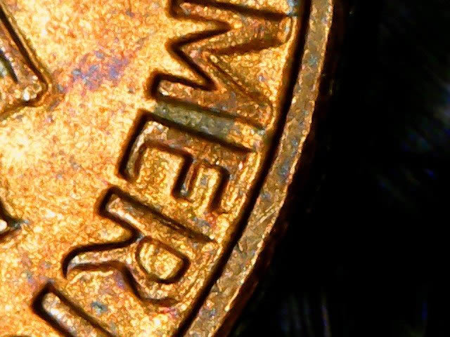 Can-Someone-Tell-Me-What-These-Marks-Are-Called-On-My-1975-D-Lincoln-Cent?