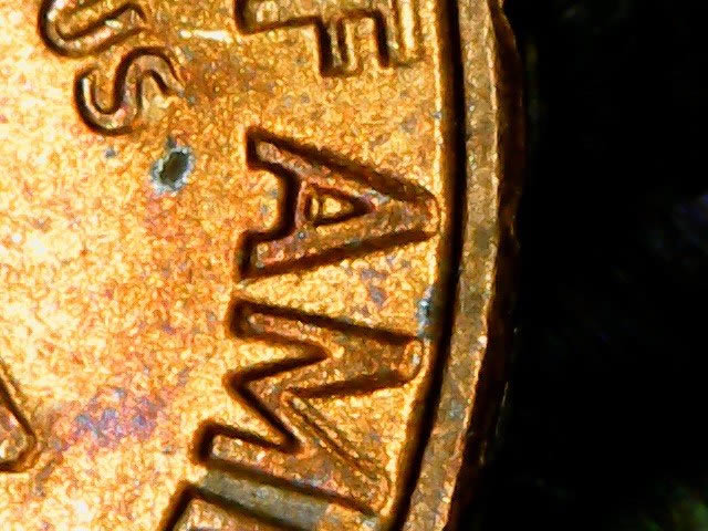 Can-Someone-Tell-Me-What-These-Marks-Are-Called-On-My-1975-D-Lincoln-Cent?