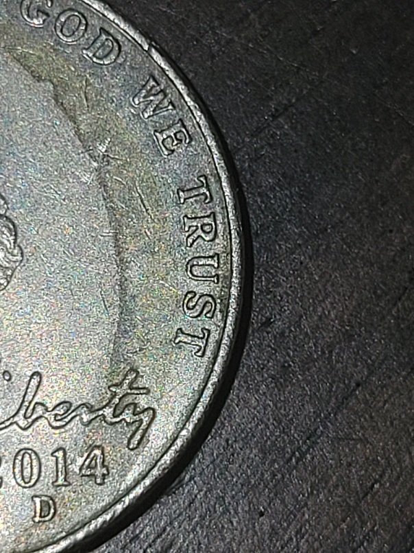 2014-Nickle-Shading-Or-Strike-Error?