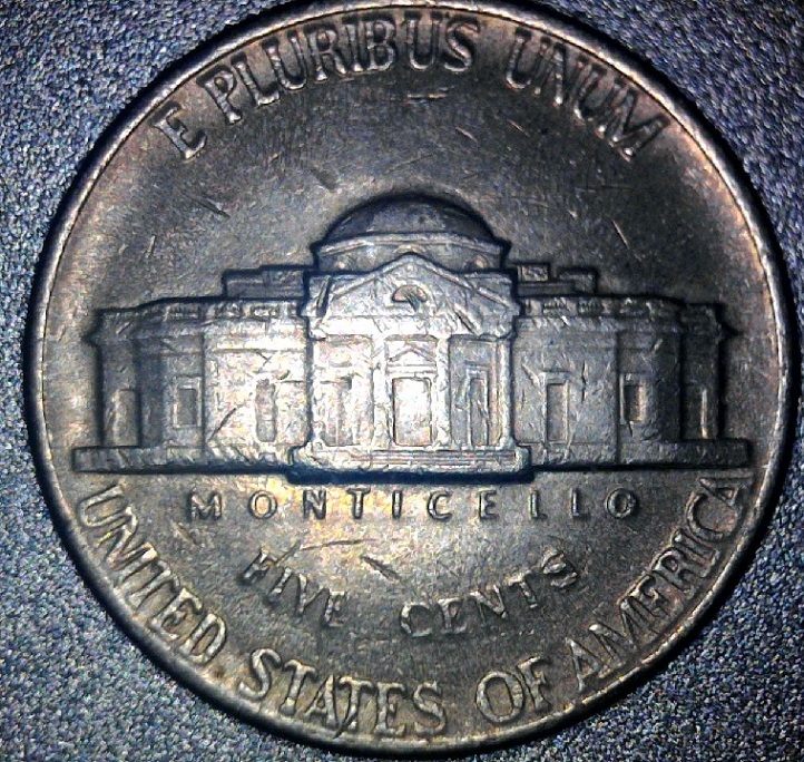 Error-Or-Minting-Mistake-Found-On-A-1994-P-Nickel-Collar-Area.