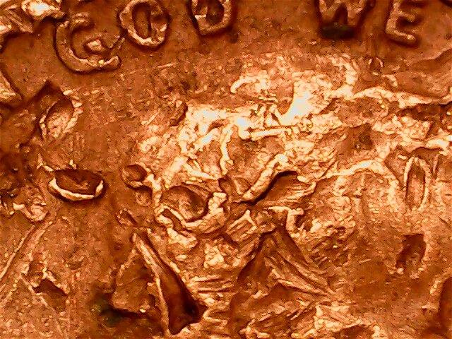 1975-D-Penny.-Punch-Throughs?