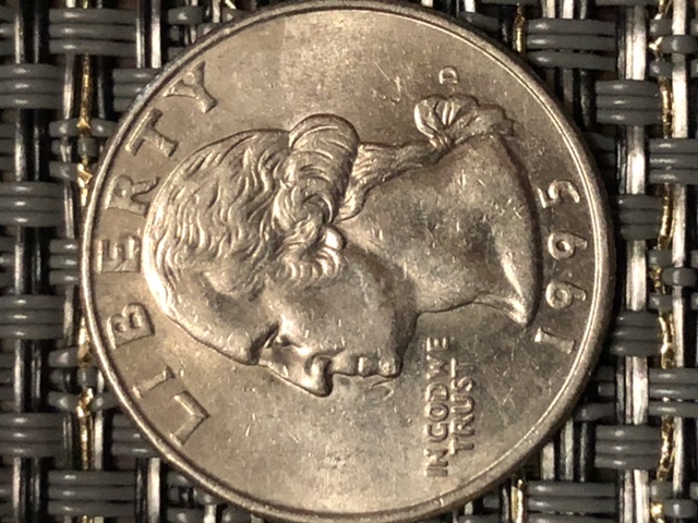 1995-Quarter-With-Something-Underneath-Letters