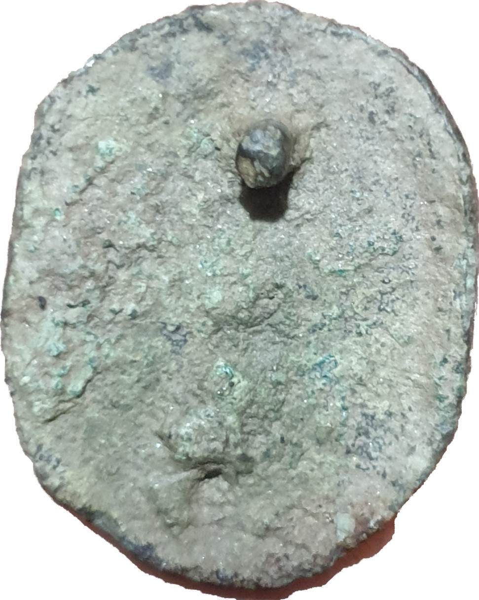 Could-It-Be-Some-Sort-Of-Brooch-Or-Medal?
