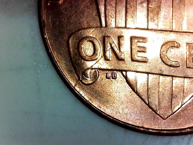 Post-A-Coin-Or-Medal-With-A-Die-Crack!