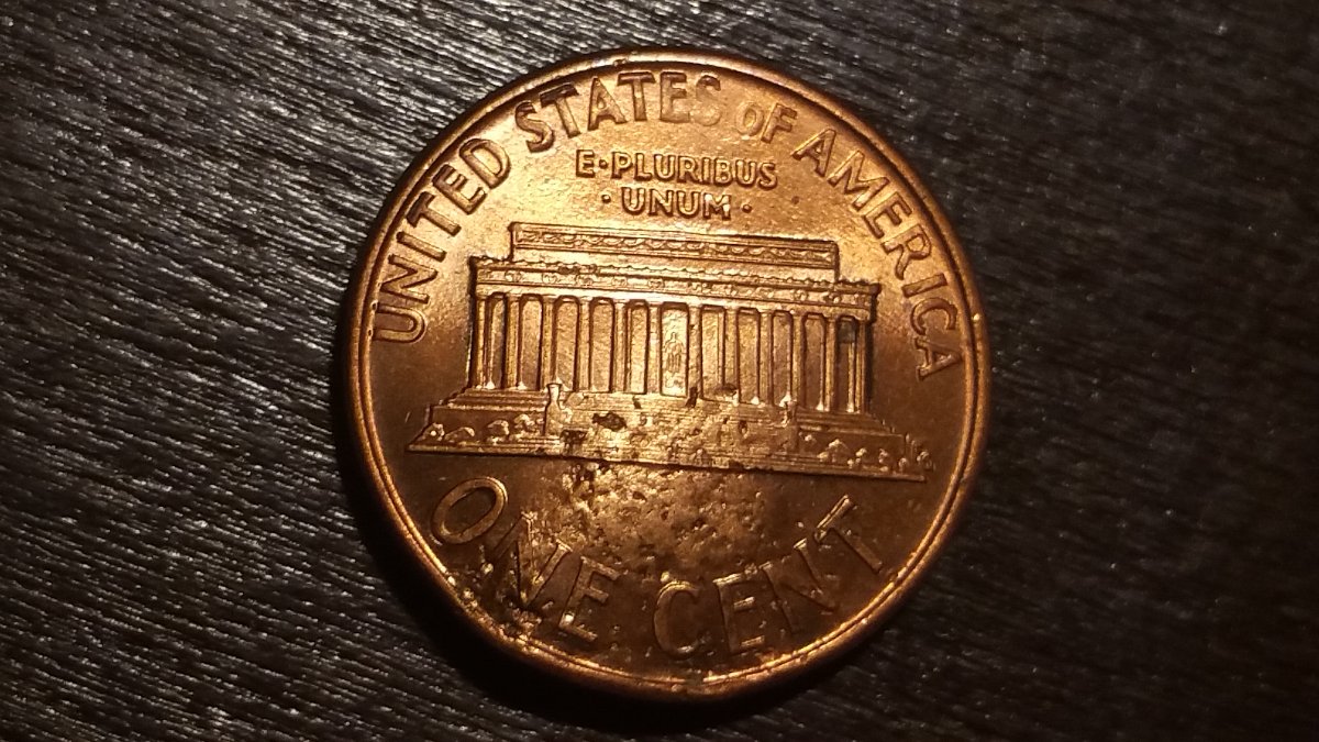 1990-LMC-Major-Struck-Through-Possible-Washer?-Or-Damage?