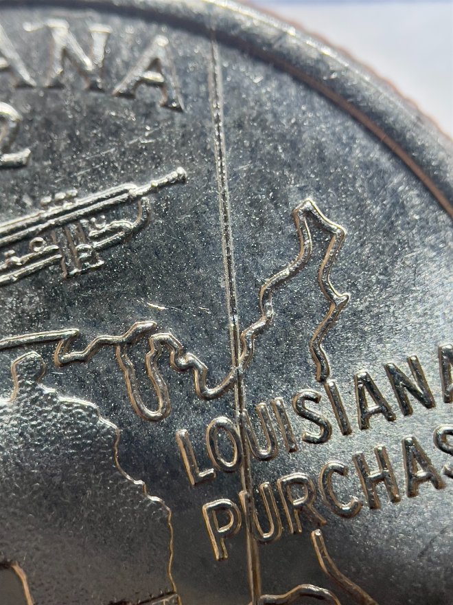 2002-D-Louisiana-Quarter---Weird-Line
