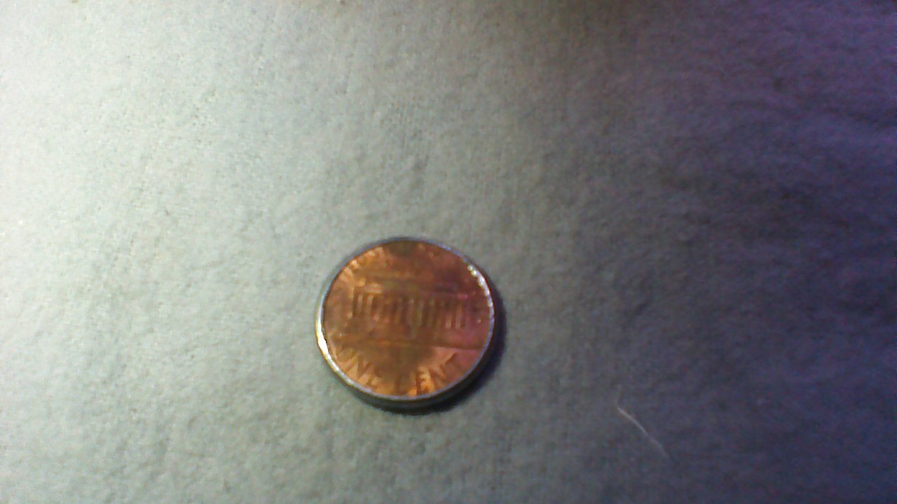Can-Someone-Help-Me-Out-With-This-1990-Penny-With-A-Silver-Like-Edge.