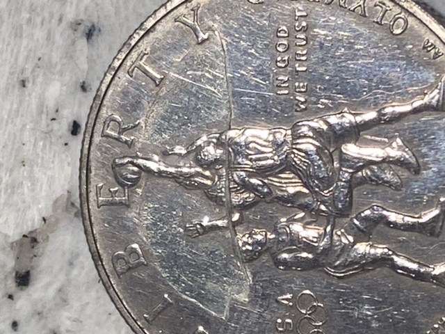 What's-On-This-1995-S-Olympic-Basketball-Half-Dollar?-An-Error?