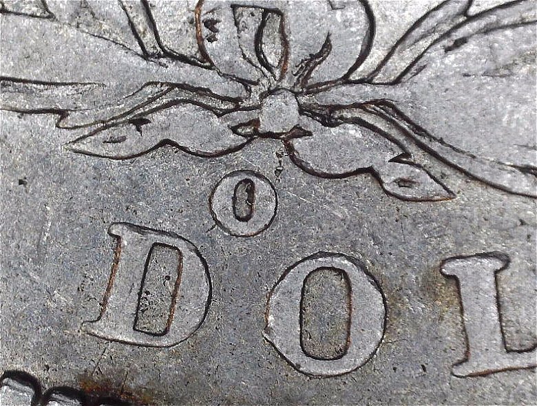 1889---O-Morgan-With-What-Looks-Like-A-Backwards-C-In-The-O-Mint-Stamp-Help