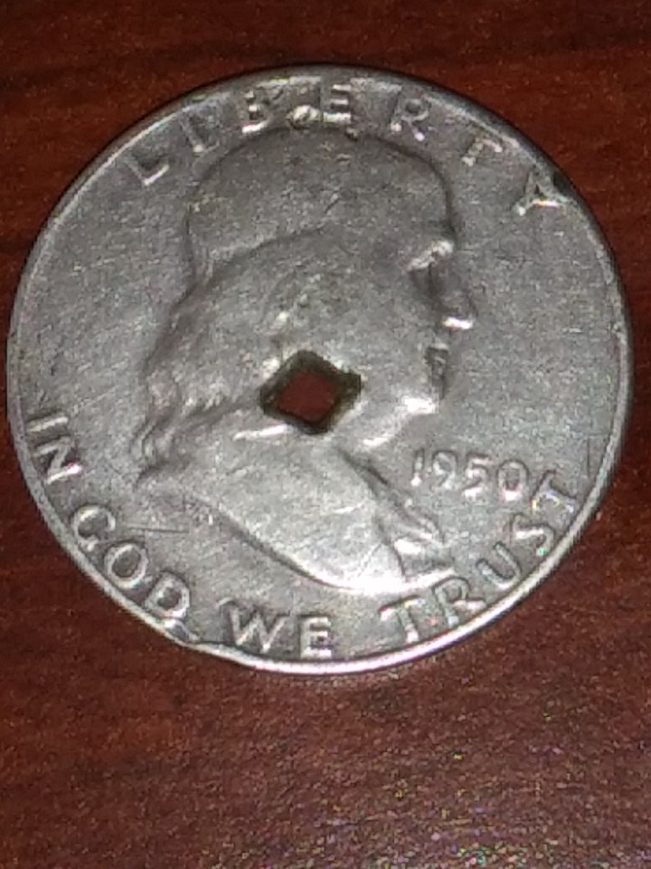 Are-These-US-Coins-Worthless-If-They-Have-A-Whole-Through-Them?