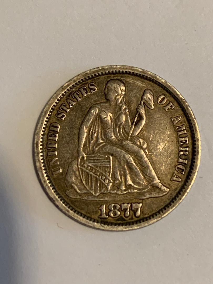 Good-Day.-1877-CC-Dime,-Worth-Grading-It?-Please-Comment.