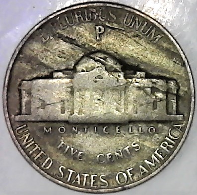 Here's-A-1945-P-Nickel-With-A-Few-Things-Going-On