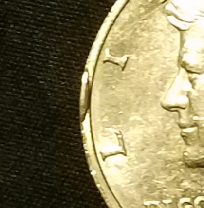 1983-Kennedy-Half-With-Cud-On-Rim?