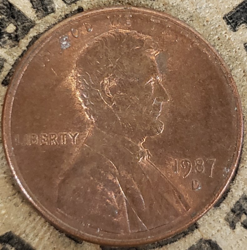 1987-Denver-Mint-Lincoln-Cent-With-A-Line-Through-God-We-Trust