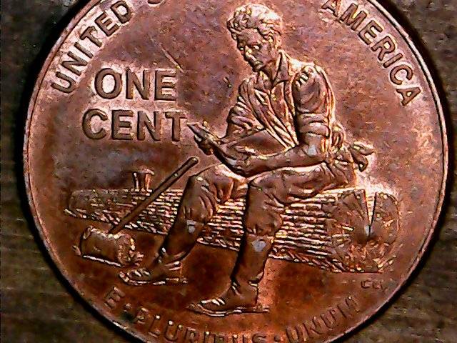 2009-Lincoln-Cent--Ball-Of-Paper-In-Hand