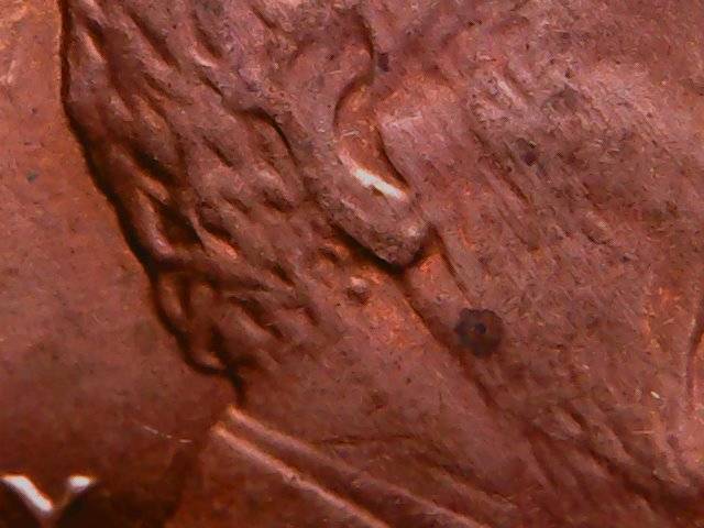 1990-P-Memorial-Cent-Behind-The-Ear?