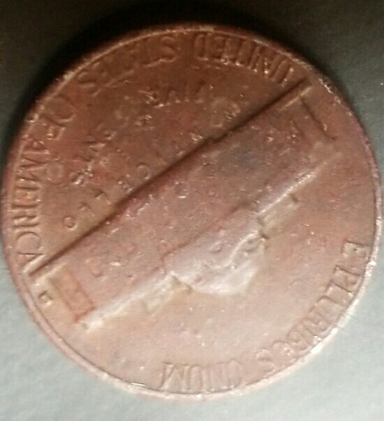 Has-Anyone-Seen-A-1964-D-Nickle-Red?