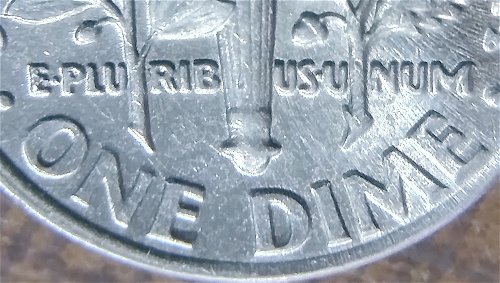 2000-P-Dime-Struck-Through-Something-With-Doubling