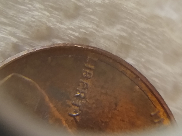 Cracked-1988--Penny.--Shows-Through-Both-Sides.