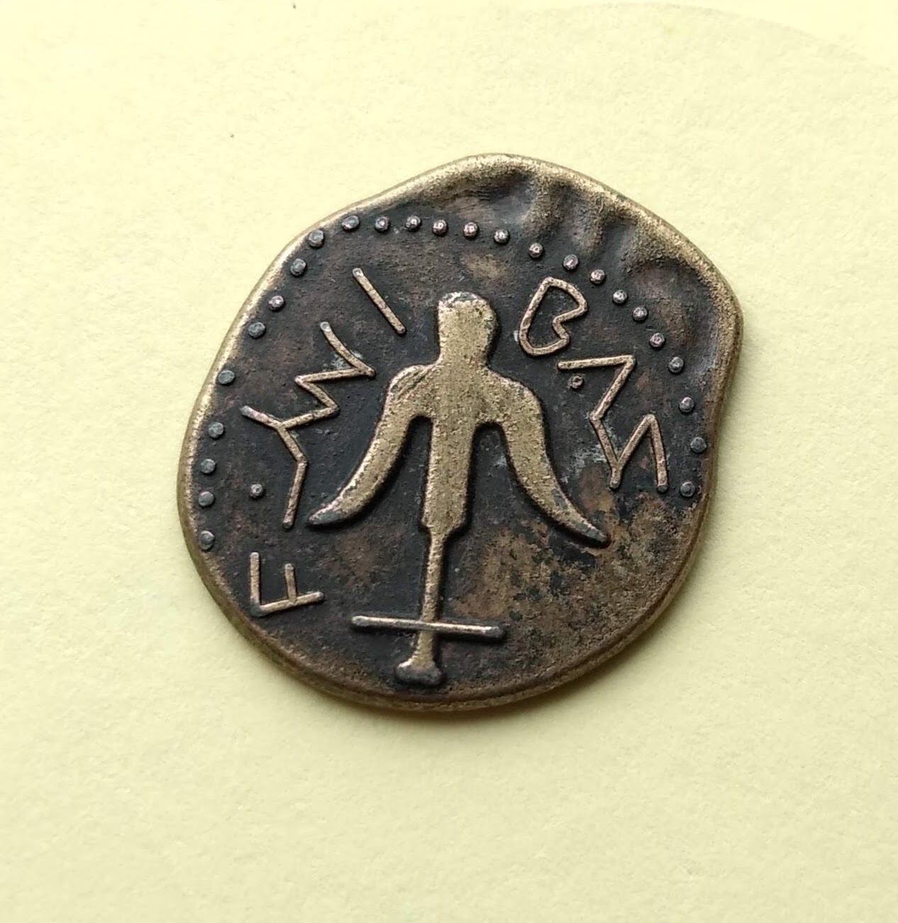 Novice-With-An-Unidentified-Coin