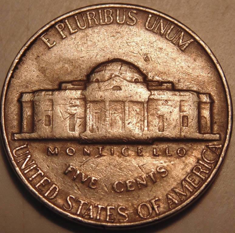 1964-Nickel-Hole-On-The-Cheek.