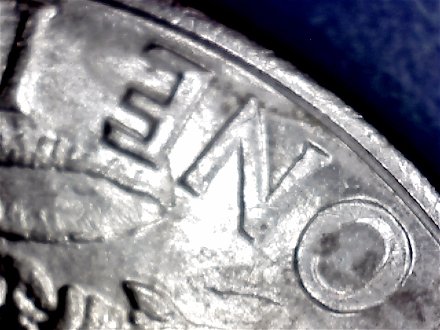 1971-Ike-Dollar-With-Something-Underneath-The-Strike?-Doubling-As-Well-Help
