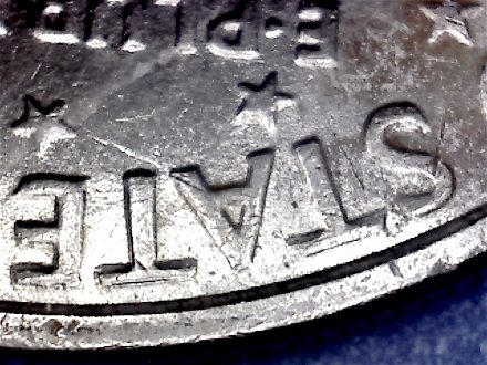 1971-Ike-Dollar-With-Something-Underneath-The-Strike?-Doubling-As-Well-Help