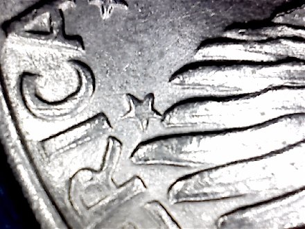 1971-Ike-Dollar-With-Something-Underneath-The-Strike?-Doubling-As-Well-Help