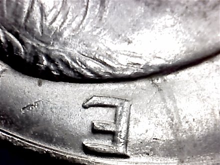 1971-Ike-Dollar-With-Something-Underneath-The-Strike?-Doubling-As-Well-Help