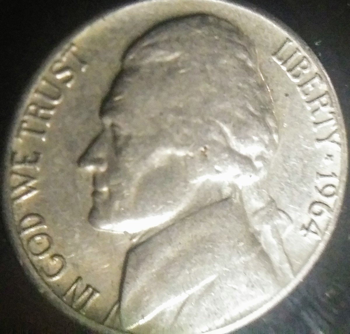 1964-D-Jefferson-Nickel-Struck-Over-A-Different-Coin?