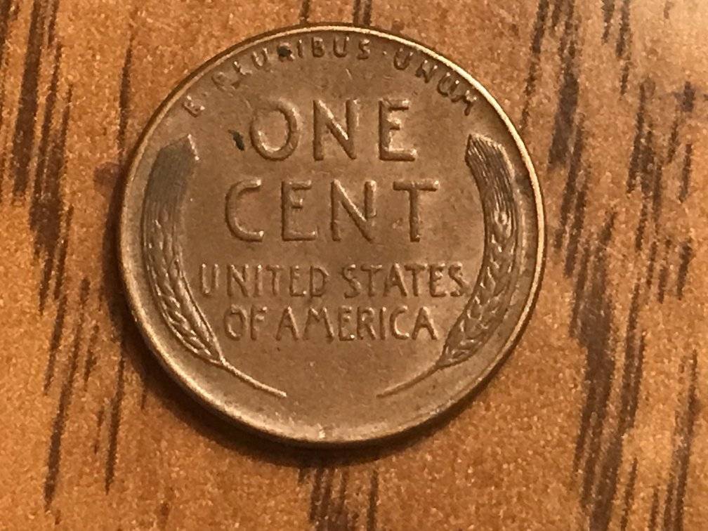 1958-Wheat-Penny-Pulled-Out-Of-A-Roll-Today