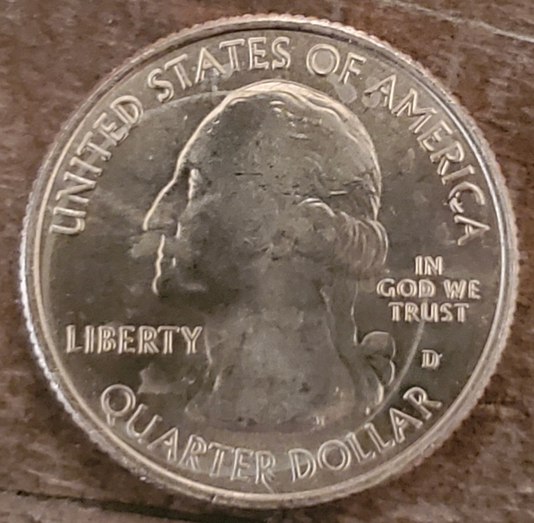 2019-Idaho-Quarter-With-Staining-Or-Toning?