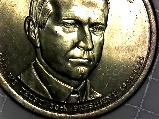 Quarter-With-Possible-Rockwell-Test-Mark-Two-Triangle-Shaped-Marks